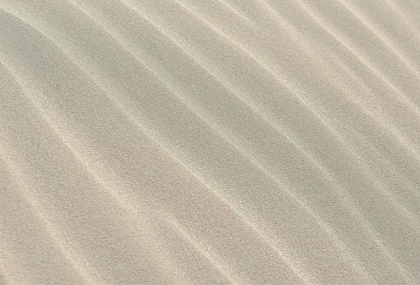 How thick should paver sand be?