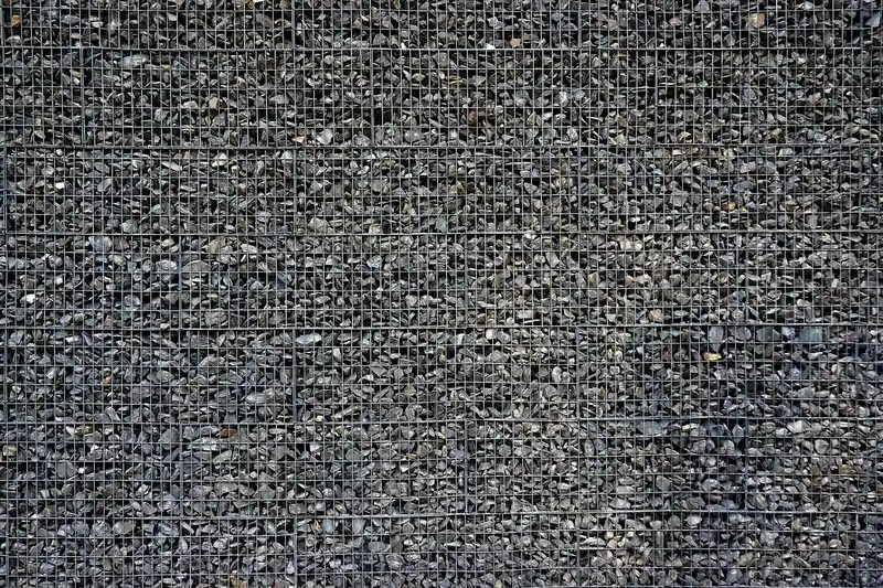 What causes retaining wall base failure?